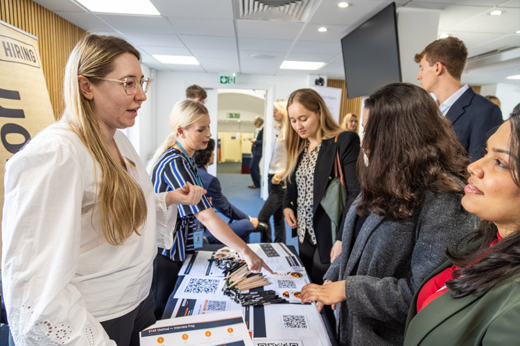 Students meeting recruiters at the ESCP London Careers Fair