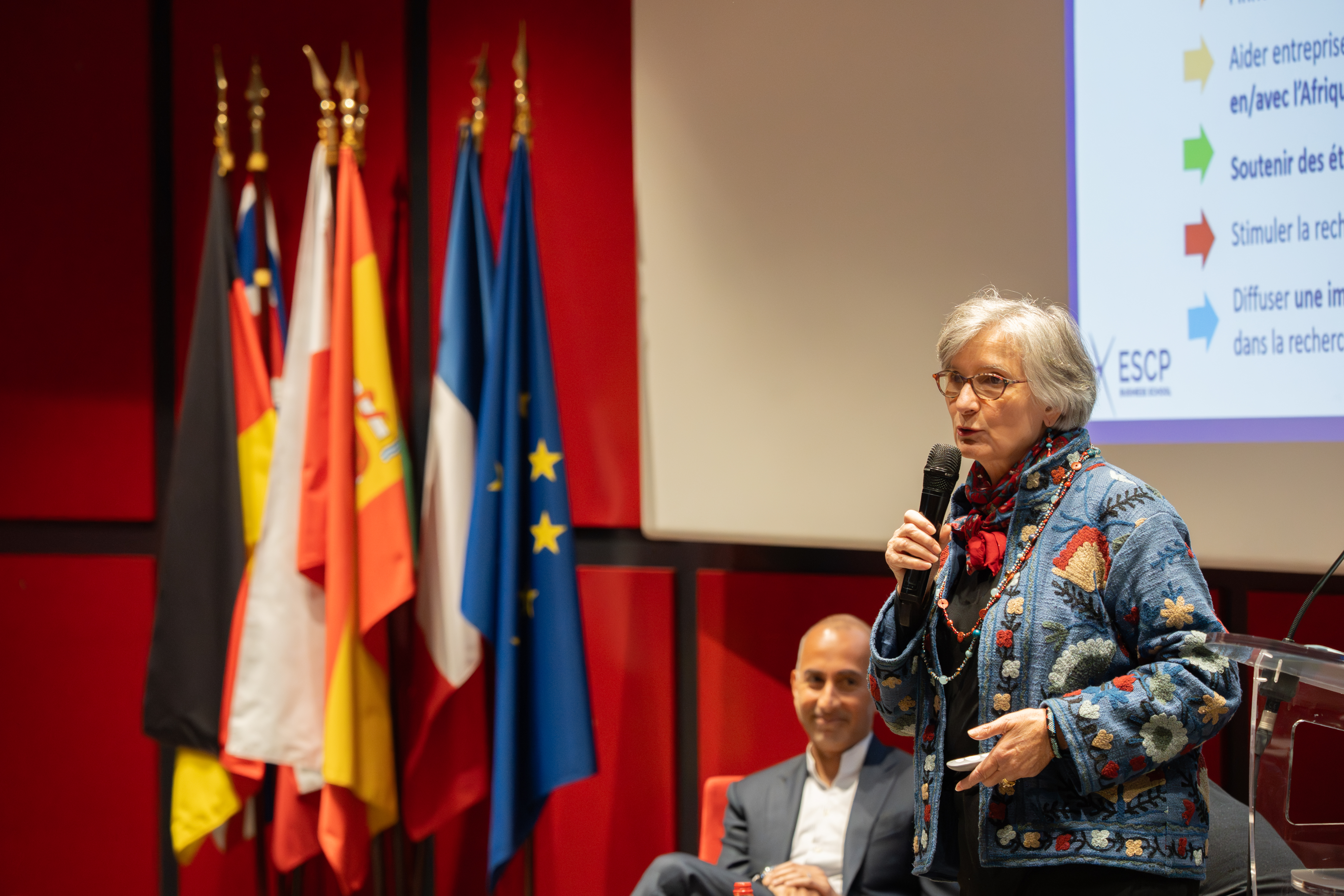 Caroline Verzat giving opening speech