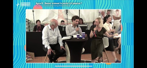 three people talk to each other