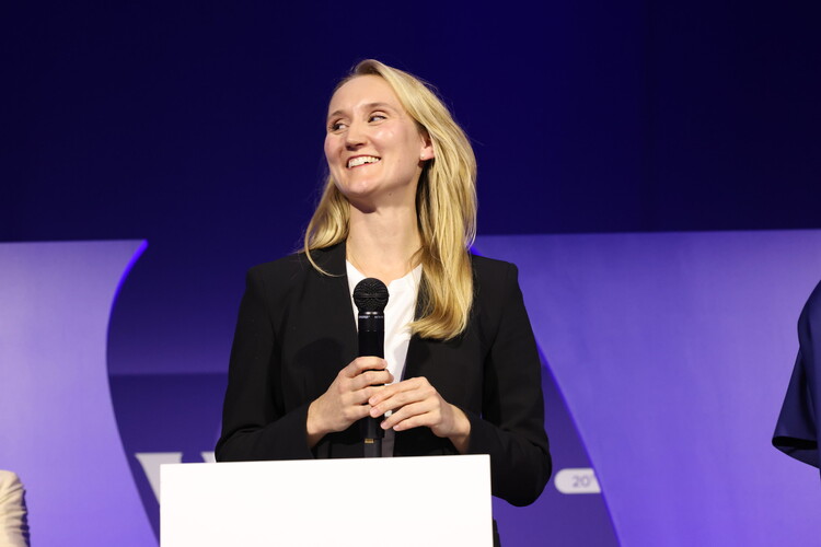 Professor Alisa Sydow on stage at the Women’s Forum