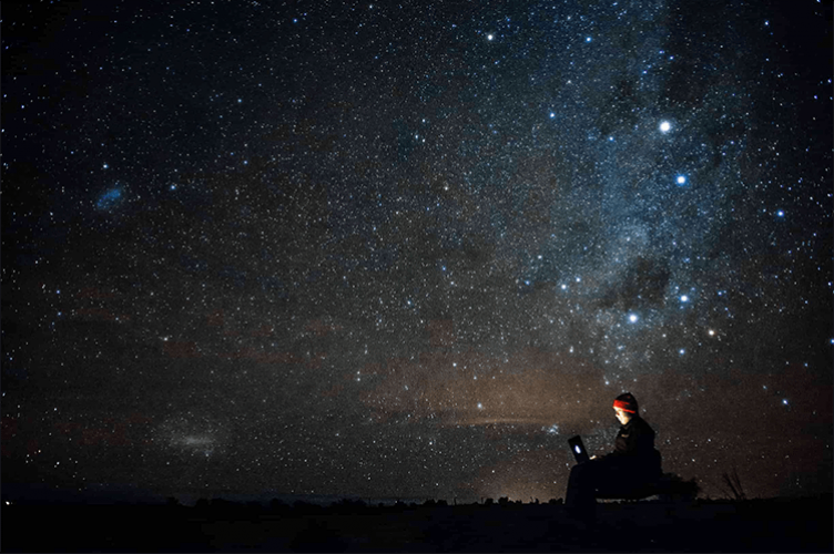 Person looking at the stars