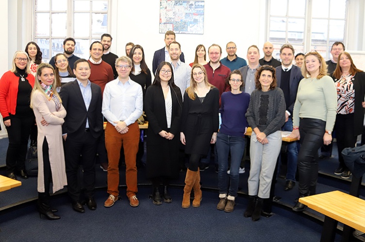 The new professors with Valérie Moatti, Pramuan Bunkanwanicha and the Faculty Dean's office staff