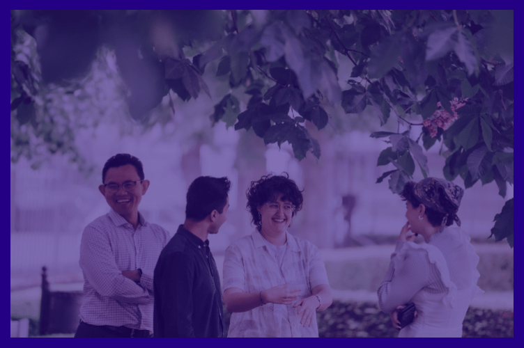 4 people speaking with each other