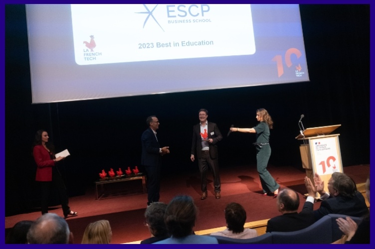ESCP staff accepting an award on a stage