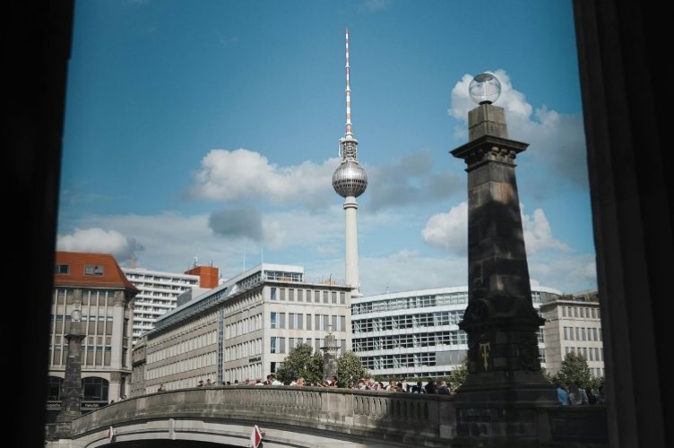 Berlin TV tower, a building, and a bridge