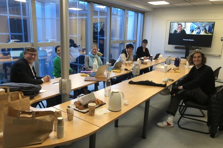 A meeting room with people