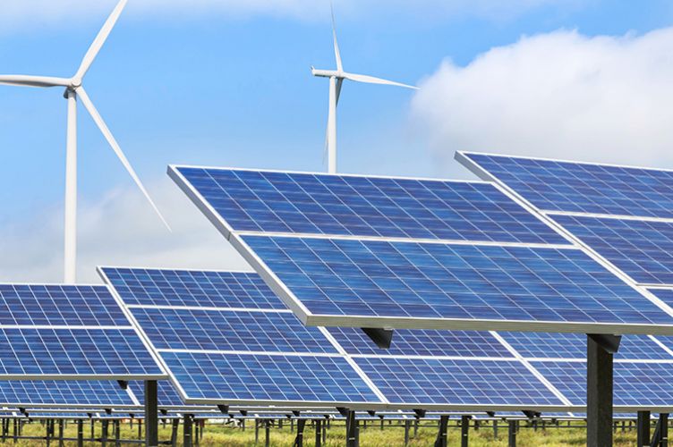 Solar photovoltaics panel and wind turbines generating electricity green energy renewable [©Soonthorn-AdobeStock-CCI Paris Île-de-France]