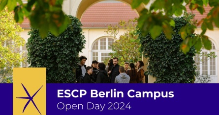 A group of students standing in the side garden of ESCP Berlin Campus