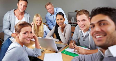 Office coworkers smiling and working together, ESCP