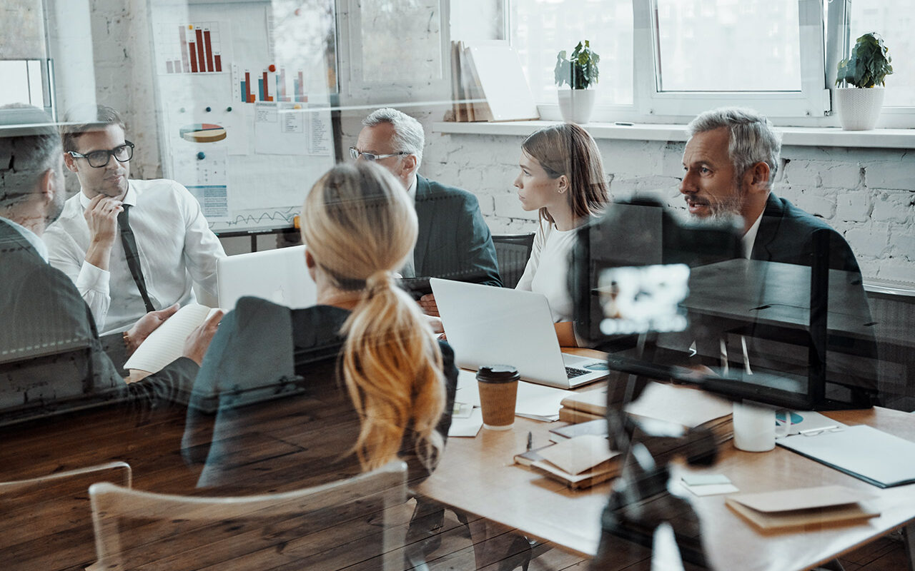 AdobeStock – gstockstudio Successful business team discussing strategy