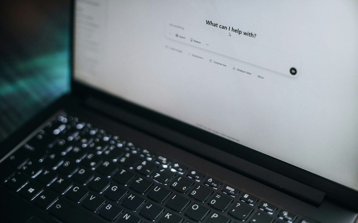 Photo of a laptop computer with ChatGPT on the screen