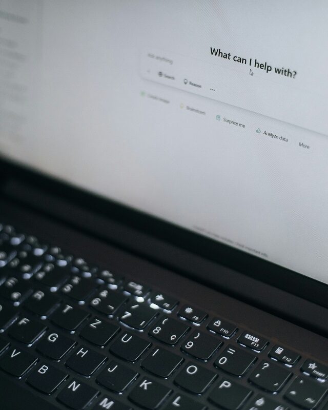 ©Aerps.com / Unsplash Photo of a laptop computer with ChatGPT on the screen