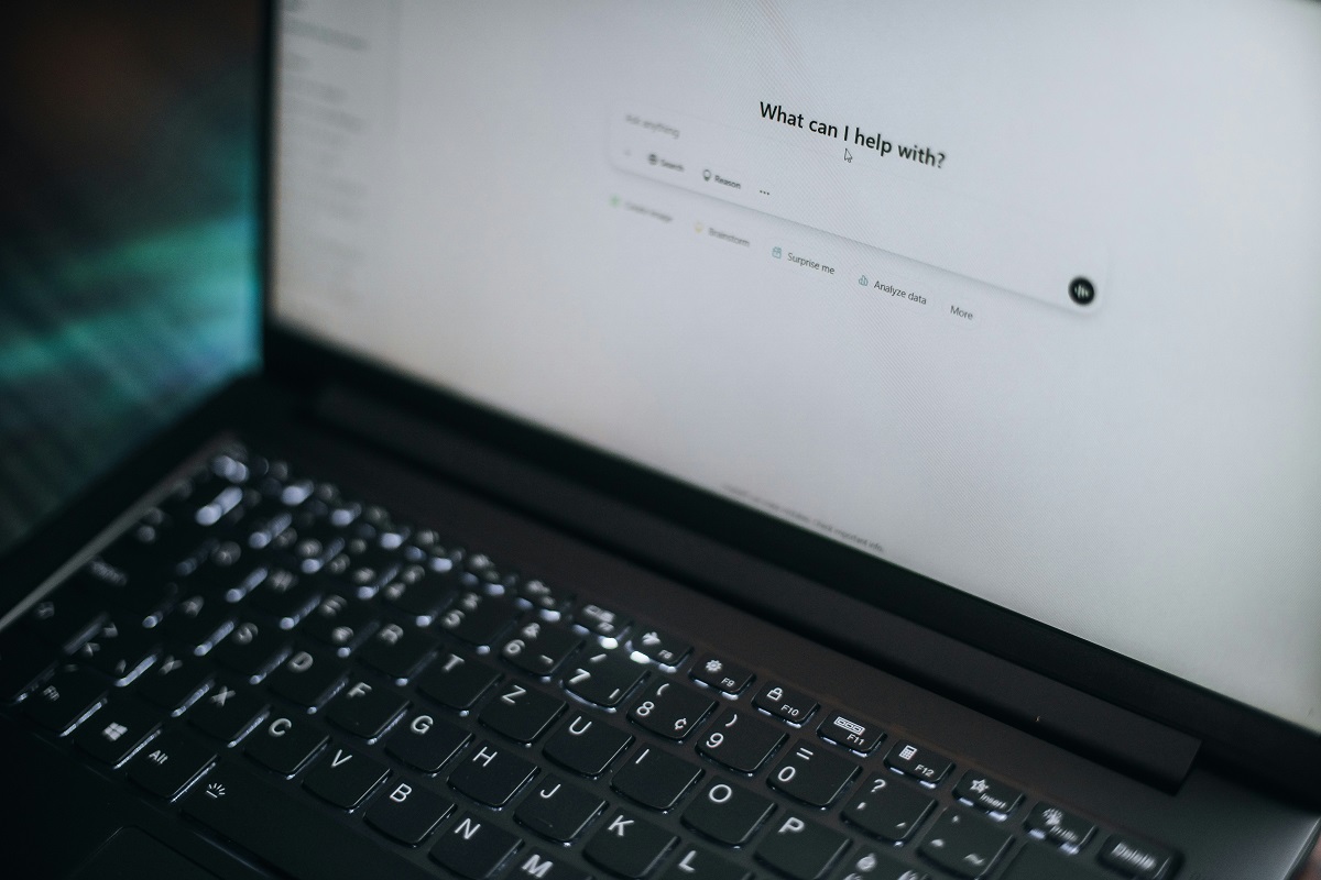 Photo of a laptop computer with ChatGPT on the screen