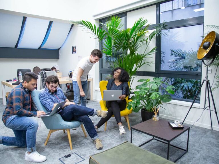 Photo of members of the Aircall team in the office.