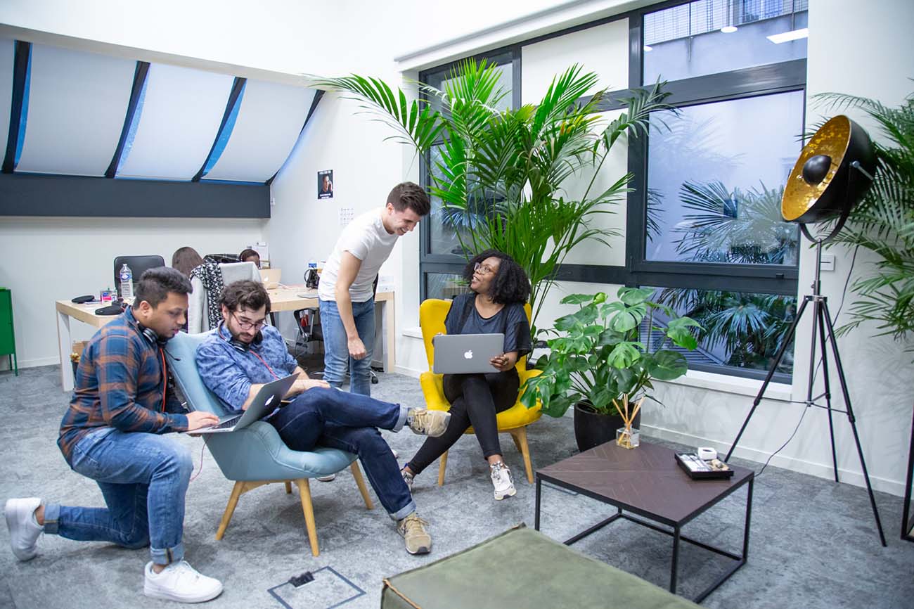 Photo of members of the Aircall team in the office.