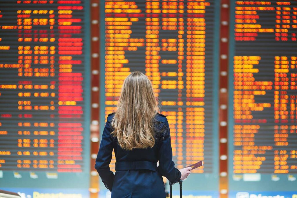 Young female traveler in international airport