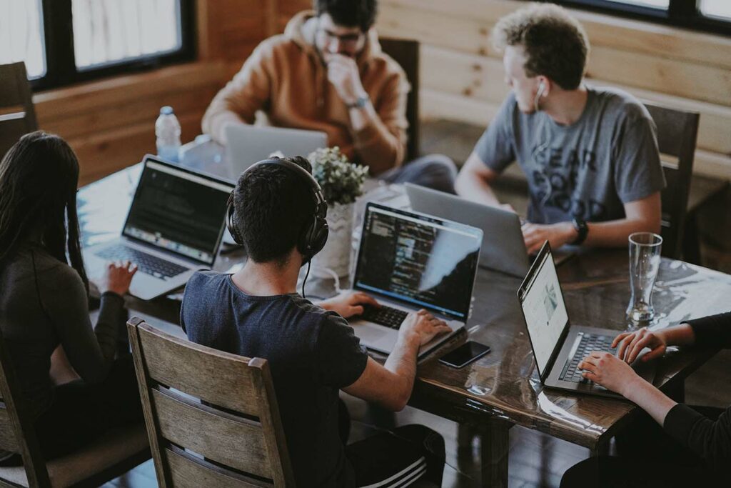 Photo of a team collaborating in an office or coworking space
