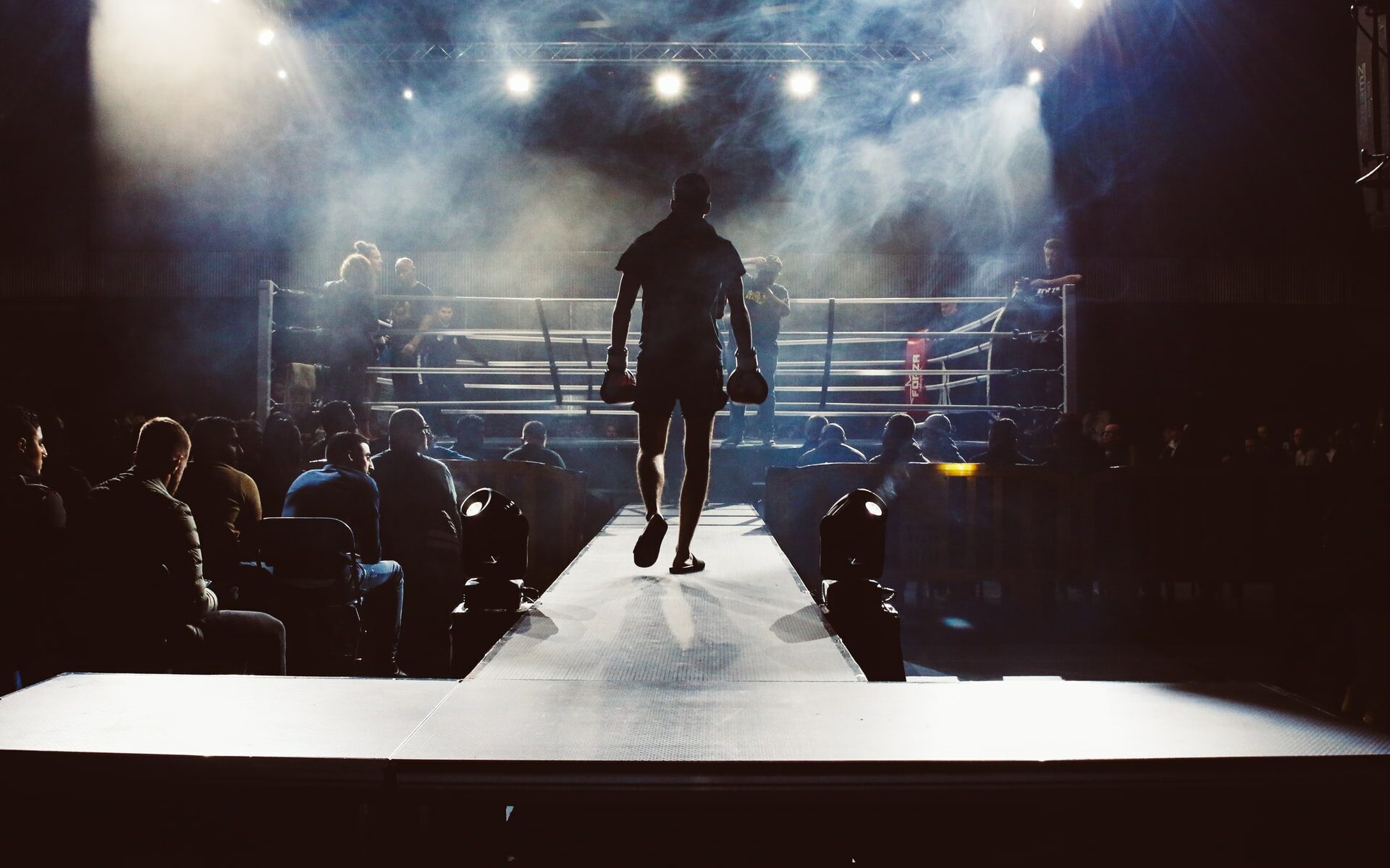 ©Attentie-Attentie/Unsplash Boxer walking out to the arena for a match