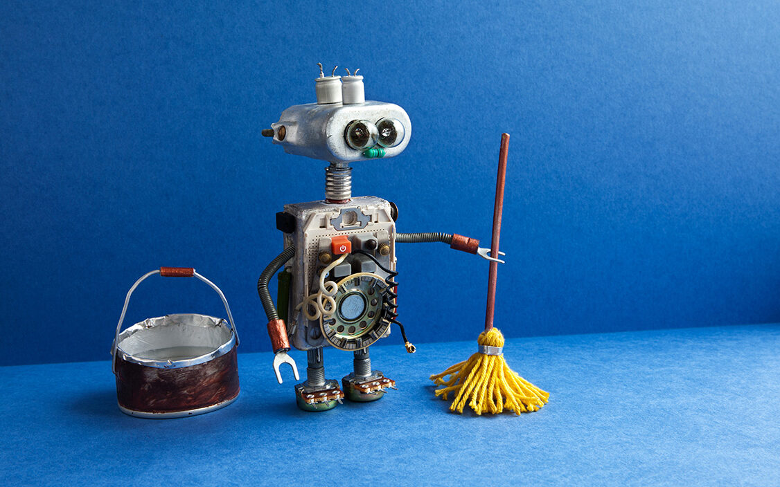 besjunior-AdobeStock Robot cleaner with yellow mop, bucket of water, sweeping floor.