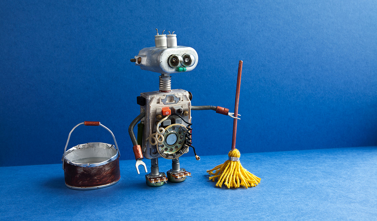 Robot cleaner with yellow mop, bucket of water, sweeping floor.