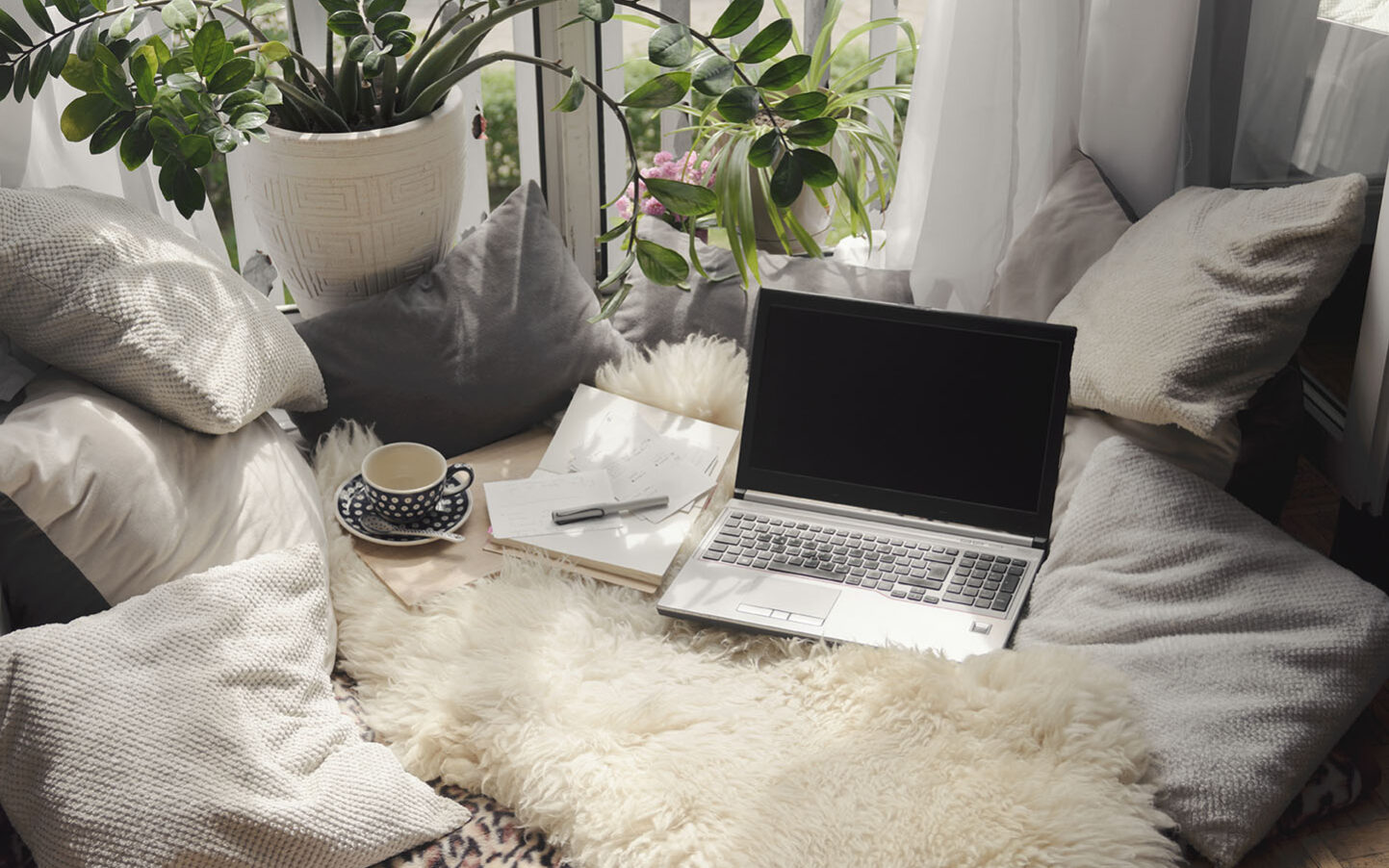Photo-Credit-Seligaa-AdobeStock Cozy place at home for working remotely