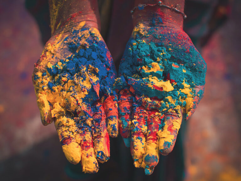 Closeup photo of person holding color soils, © Debashis RC Biswas / Unsplash