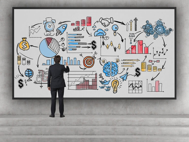 Business founder on stairs drawing a sketch.