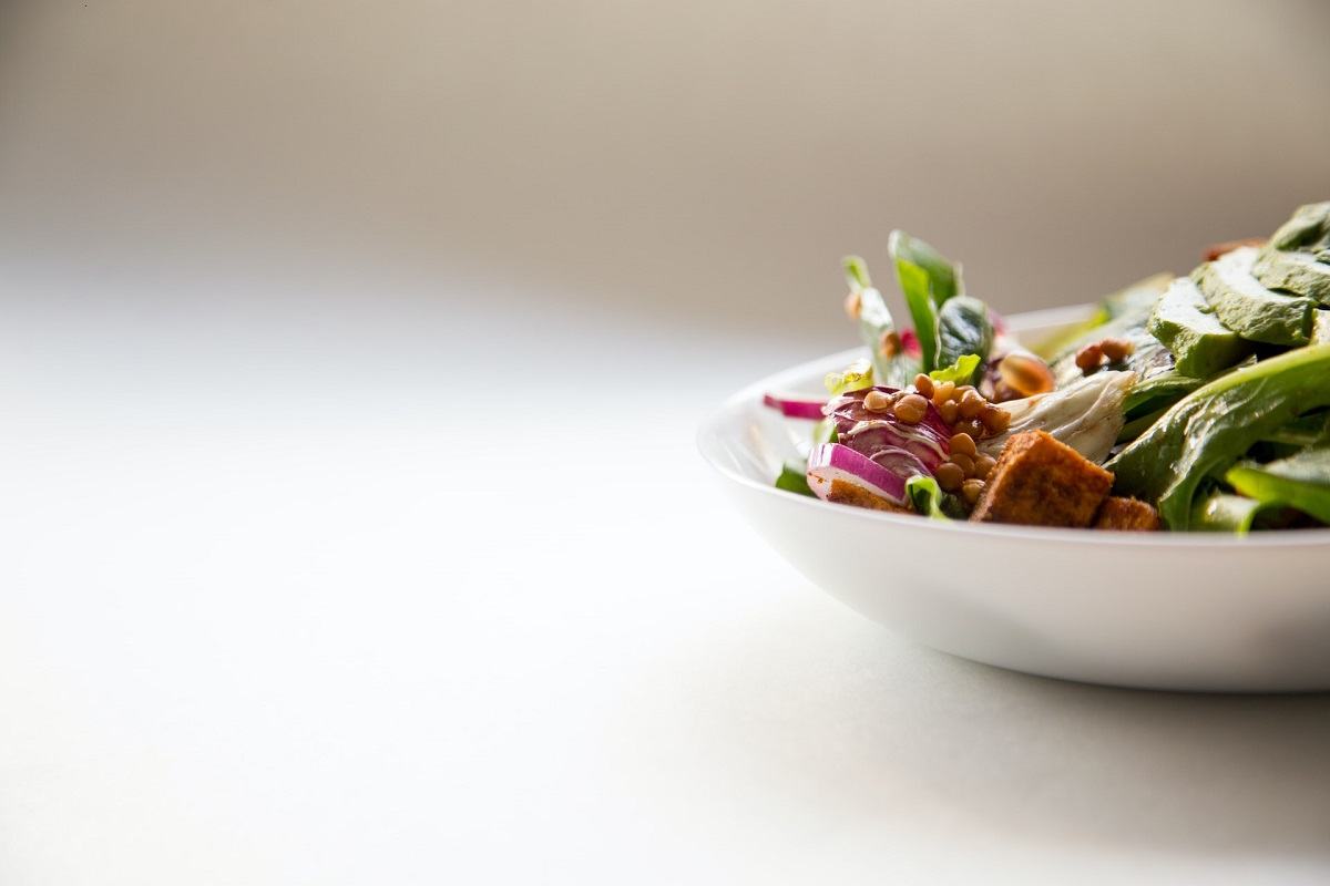 Photo of a salad with different vegatables and tofu, highlighting the uses of alternative proteins