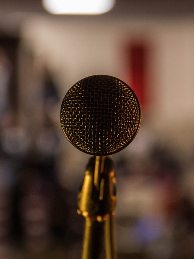 ©Ilyass Seddoug/Unsplash Image of a microphone
