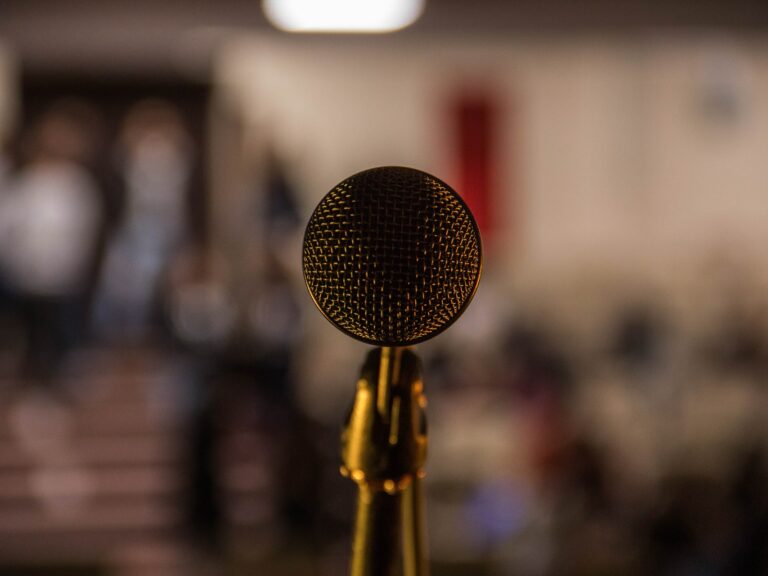 ©Ilyass Seddoug/Unsplash Image of a microphone