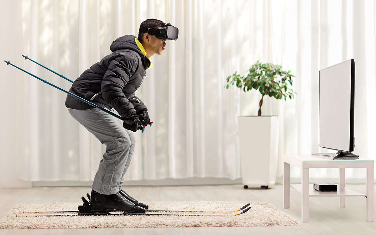 Ljupco-Smokovski-AdobeStock Man skiing with VR headset at home