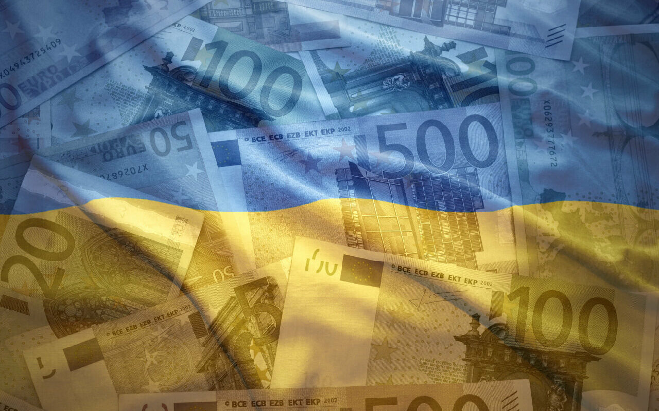 © luzitanija / Adobe Stock Colorful waving ukrainian flag on a euro money background, © luzitanija / Adobe Stock