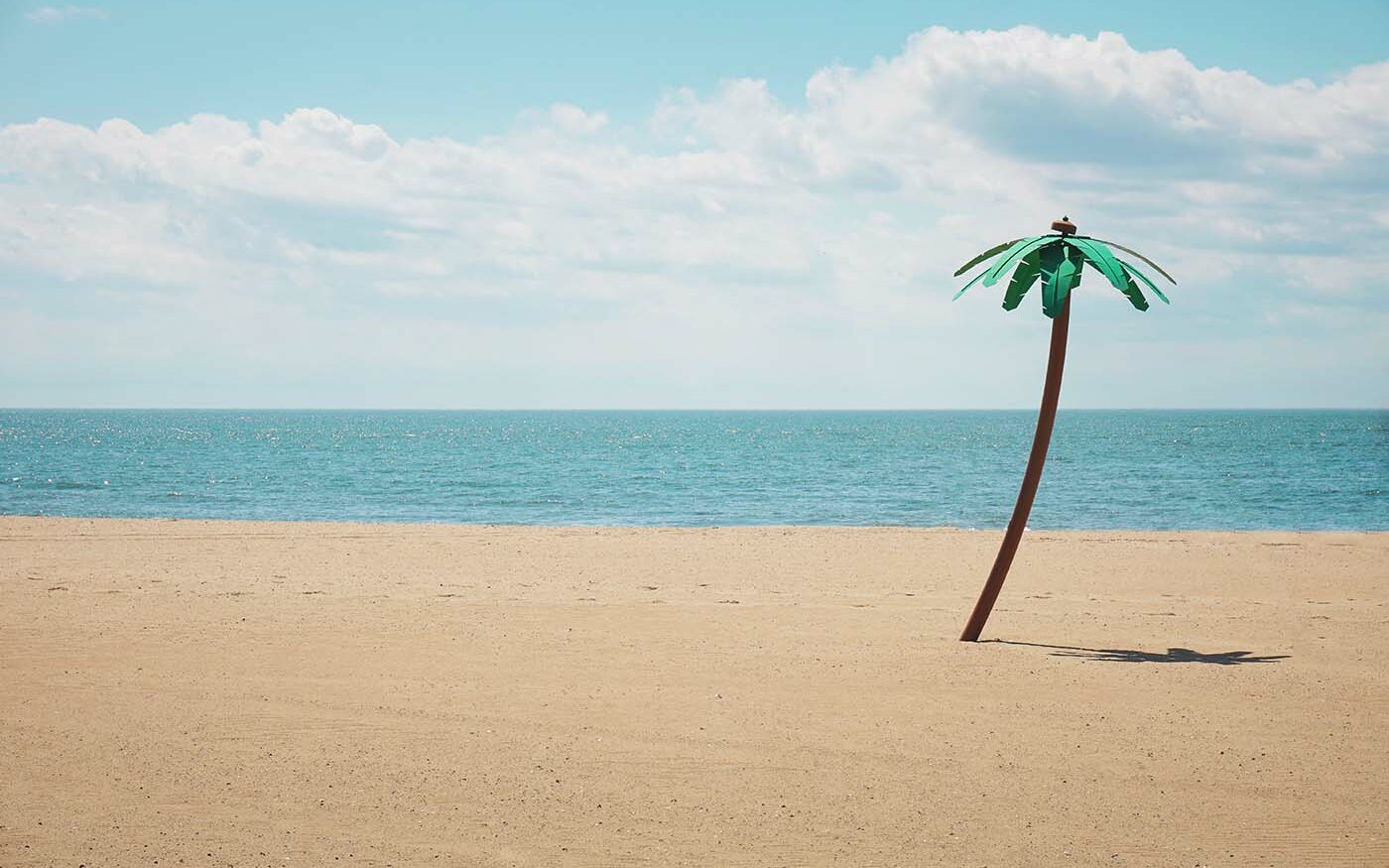 ©Maarten van den Heuvel/Unsplash Photo of a fake palm tree on Coney Island.