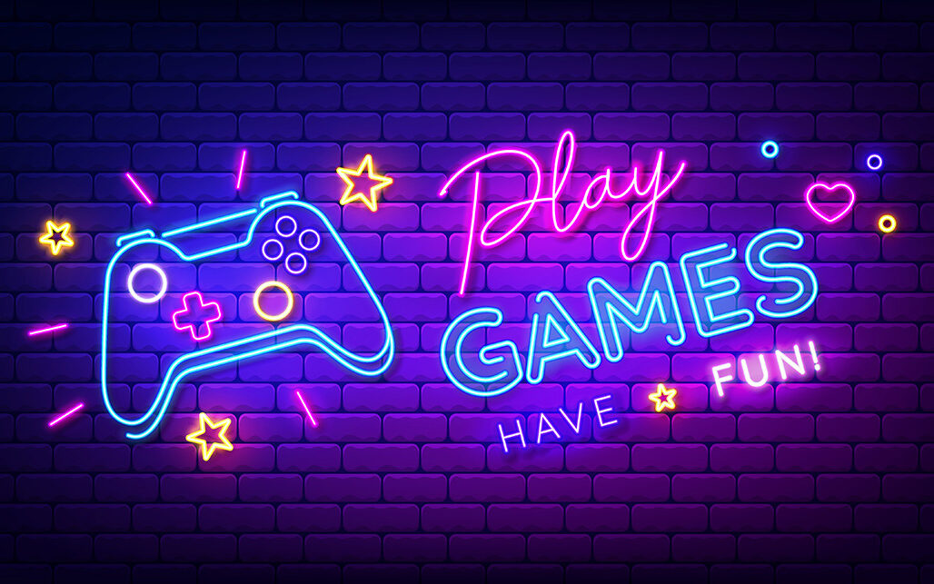 MarySan – AdobeStock Play Games have fun neon sign with game pad, bright signboard, light banner.