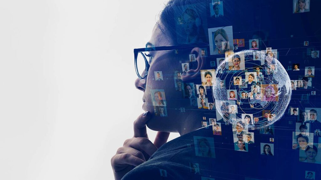 Women looking at diverse profiles for HR recruitment process.