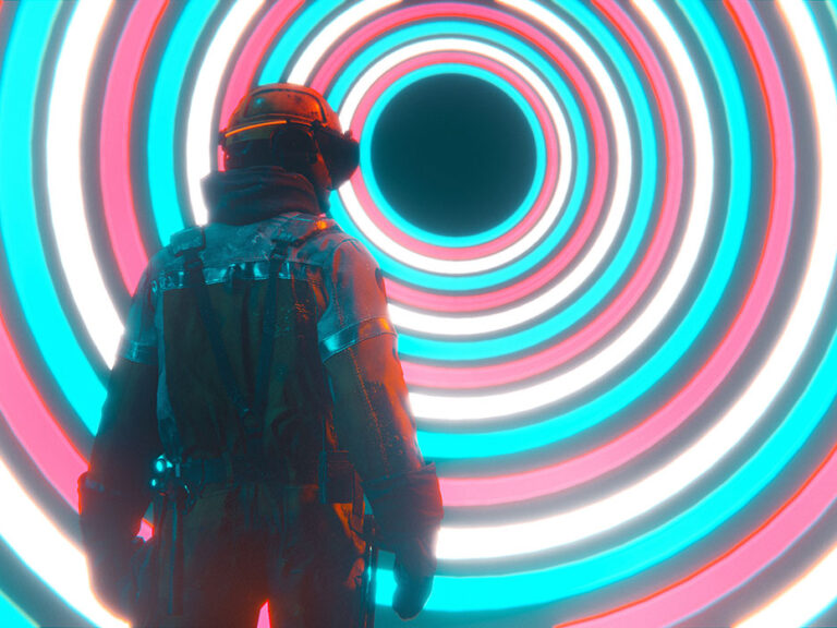 Man with headwear stands in front of spiral portal. Concept of the metaverse. © Mikkelwilliam / Istock