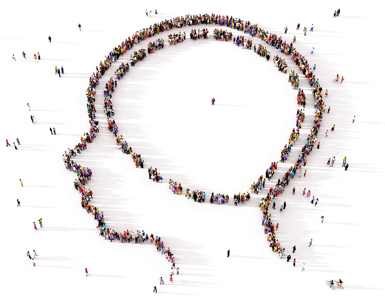 A large and diverse group of people seen from above gathered together in the shape of a symbol of the human mind