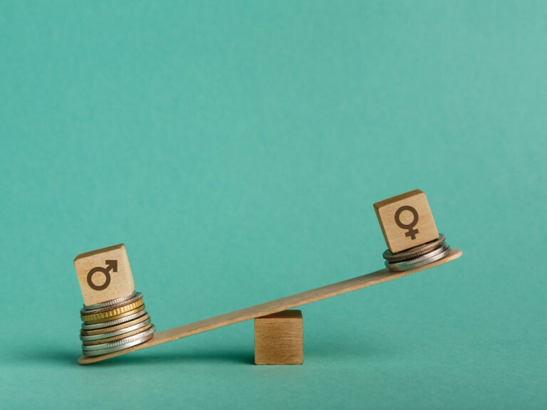 Illustration of gender pay gap with money and seesaw