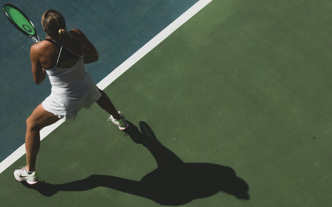 ©Renith R / Unsplash Overhead picture of a woman playing tennis