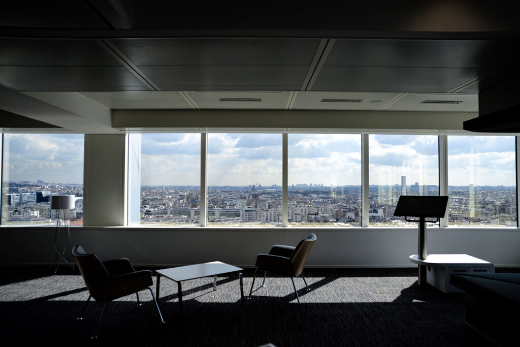 Two chairs near podium, virtual teams in empty office, Romain V, Unsplash
