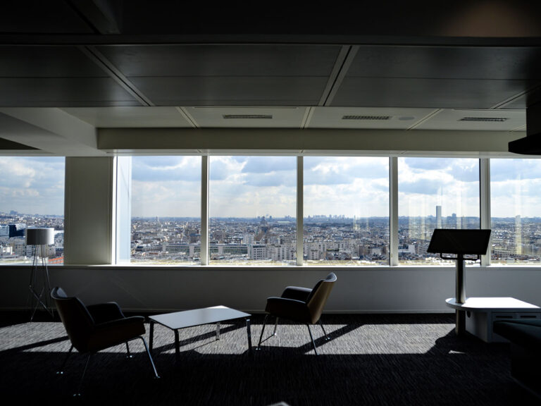 Two chairs near podium, virtual teams in empty office, Romain V, Unsplash