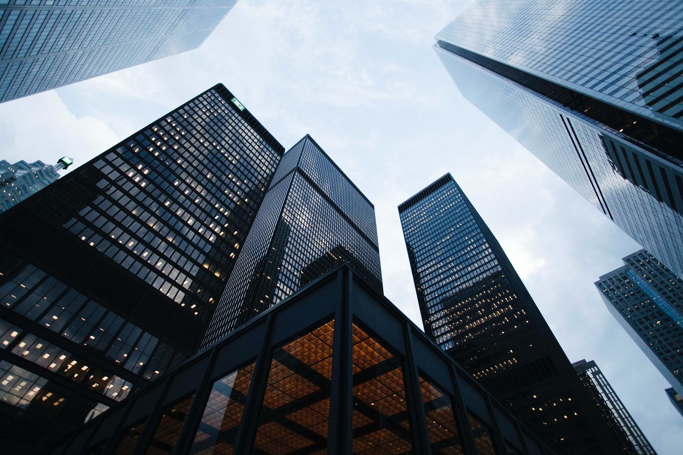 ©Sean Pollock/Unsplash. Image of someone looking up at a building.