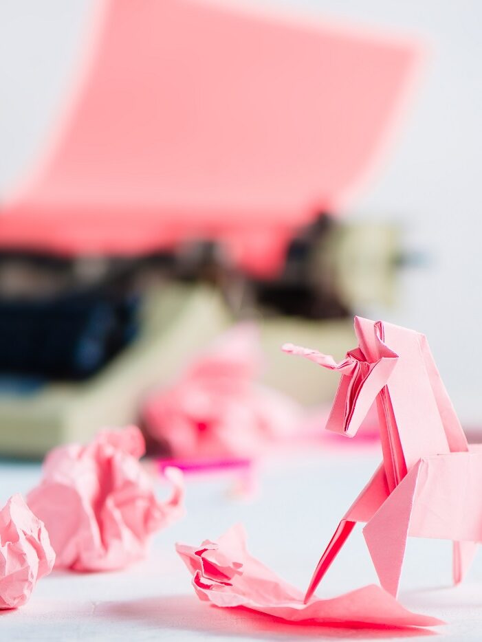 @Dina Belenko/Shutterstock Image of a paper unicorn after several unsuccessful tries. Representing perserverance and creativity.