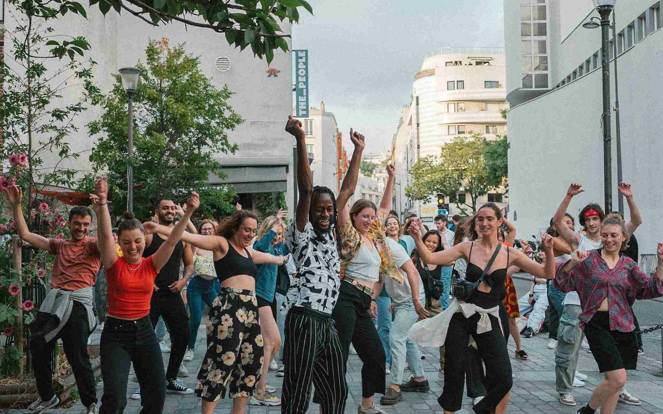 @Pauline Terestchenko Group of people dancing in a city street