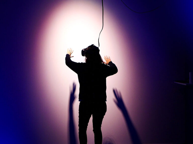 Person using VR headset, ©Stella Jacob / Unsplash