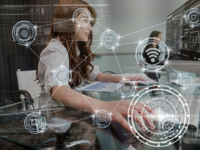 technology digital virtual screen and Wireless communication connecting over the hand young asian business woman pressing the keyboard of computer in modern Office, business internet of thing