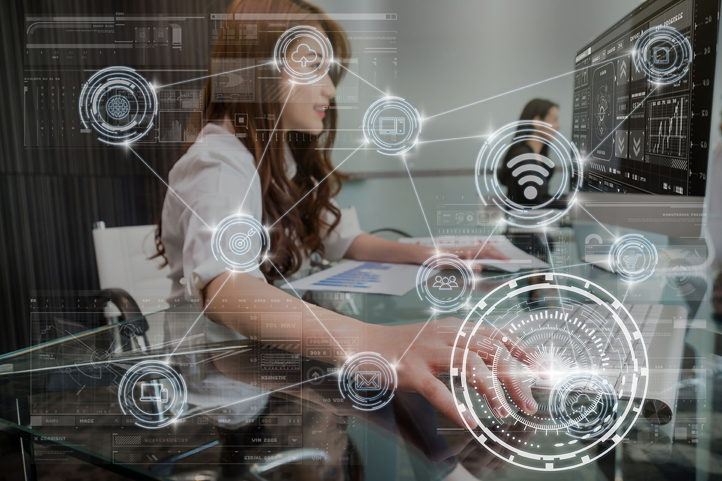 technology digital virtual screen and Wireless communication connecting over the hand young asian business woman pressing the keyboard of computer in modern Office, business internet of thing