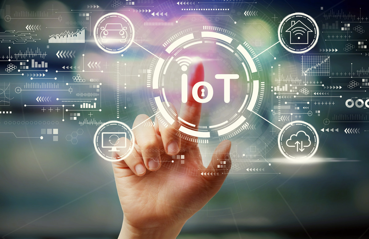 IoT theme with a hand pressing a button