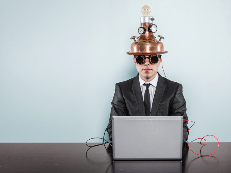 Vintage businessman sitting at office desk