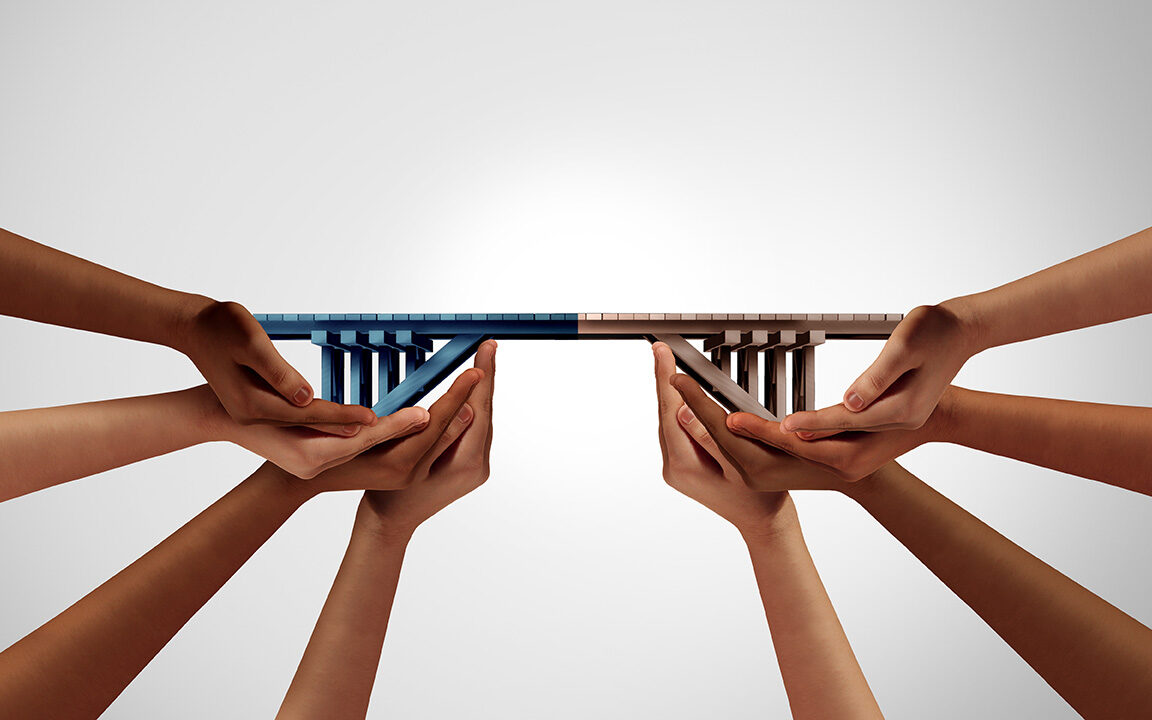 Photo-Credit-freshidea-adobe-stock Group bridge concept and building connections as a business success by joining teams together with 3D illustration.